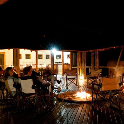 Kwando Tau Pan evening camp fire